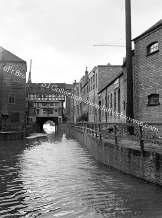 THE BRIDGE OVER RIVER WITHAM WITH TIMBERED HOUSES BUILT 1540